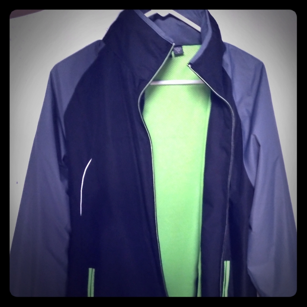 New Balance jacket with hide away hood